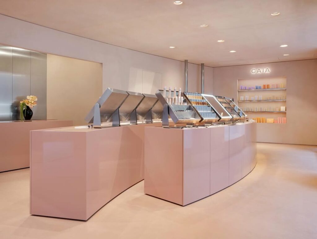 ClayLime - Mineral clay-based flooring with quartz reinforcement at CAIA Cosmetics Stockholm flagship."